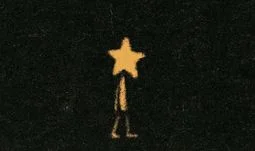 a man with a star for a head walking away 