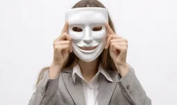woman holding mask