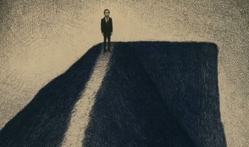 a man on top of a hill 