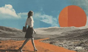 a woman walking in the desert