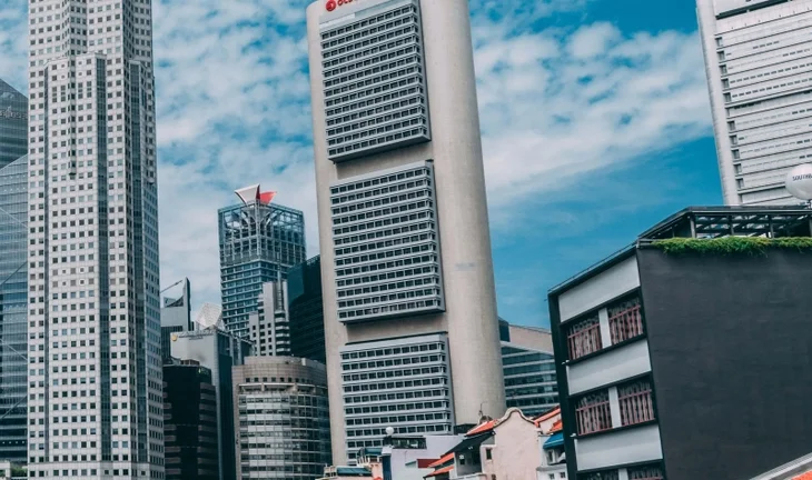 OCBC increases headcount and bonuses, hints at more hiring
