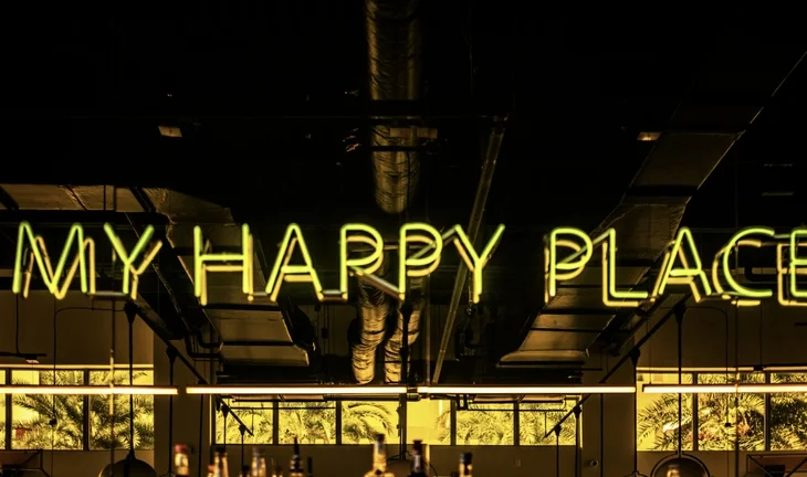 A sign reading my happy place